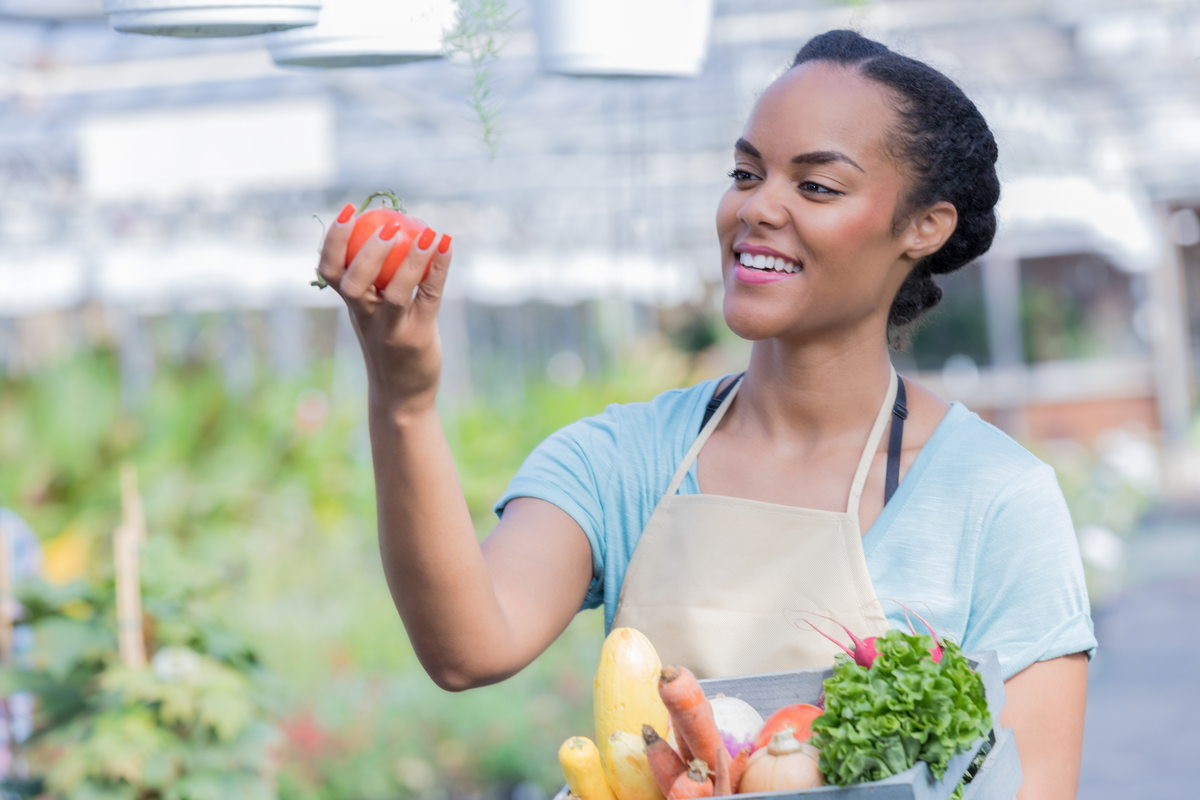Woman holding apple