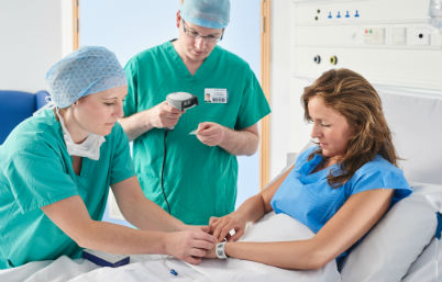 medical staff with patient 402