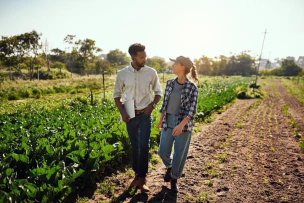 two people in a field 