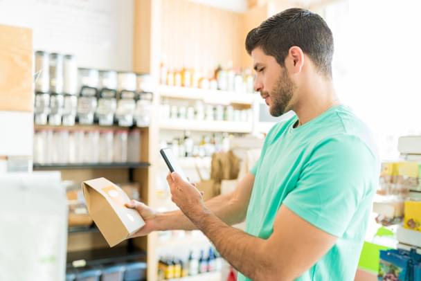 man scanning products