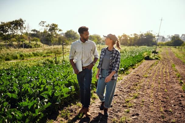 man and woman in field 