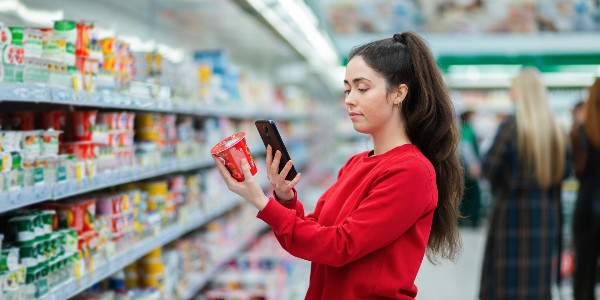 woman scanning at checkout 