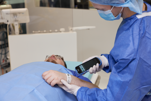 Clinician scanning a patient wristband