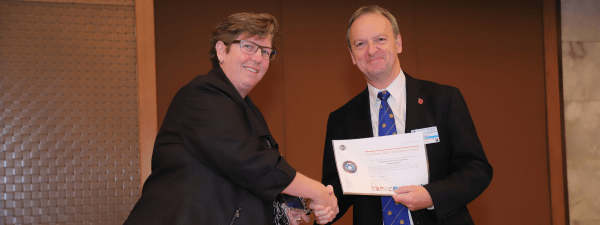 Professor Sir Terence Stephenson with award