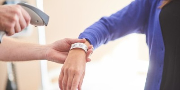 Patient wristband being scanned